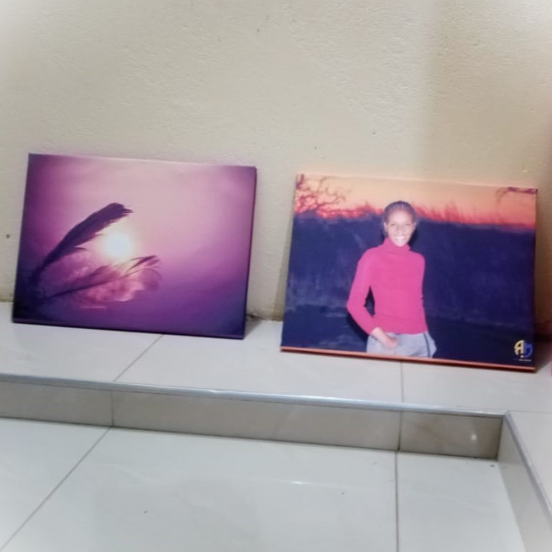Happy customer receiving canvas